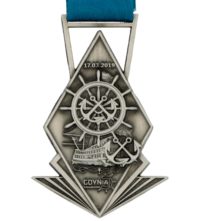 Medal odlewany z niebieską wstążką i z efektownymi ażurami