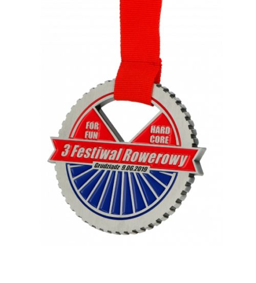Medal odlewany na czerwonej wstążce w kształcie koła roweru z stylowym ażurem