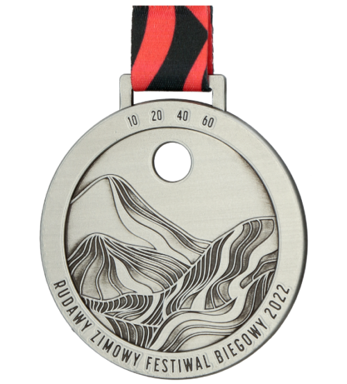 Medal na Rudawy Zimowy Festiwal Biegowy to medal odlewany nawiązujący do symboliki wydarzenia - bok