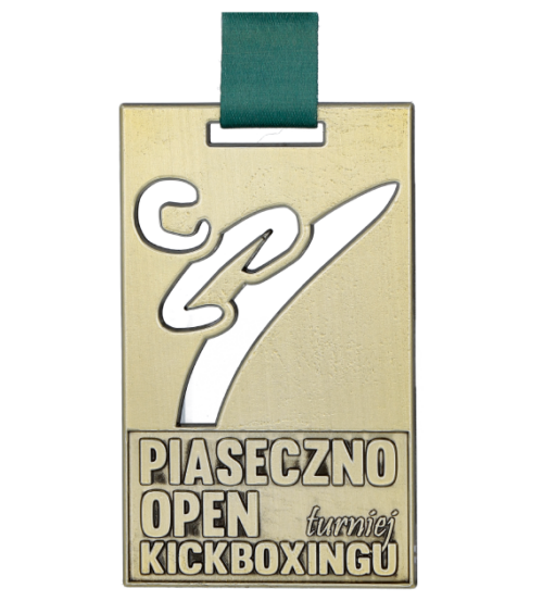 Medal odlewany na Piaseczno Open Turniej Kickboxingu o prostokątnej formie wykonany w trzech kolorach - złoto