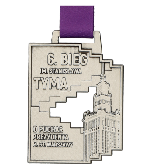 Medal odlewany na Bieg imienia Stanisława Tyma o klasycznym kształcie wzbogaconym zdobieniami nawiązującymi do stylistyki wydarzenia - przód