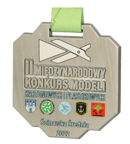 Medal na Międzynarodowy Konkurs Modeli Kartonowych i Plastikowych o symetrycznym kształcie z nadrukowami logotypami organizatorów - bok