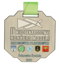 Medal na Międzynarodowy Konkurs Modeli Kartonowych i Plastikowych o symetrycznym kształcie z nadrukowami logotypami organizatorów - przód
