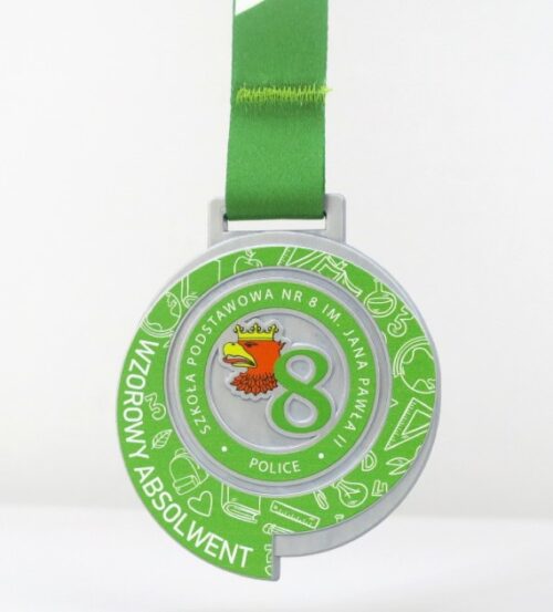 Medal Wzorowy Absolwent o owalnym kształcie z zielonym nadrukiem, logo szkoły oraz zdobieniami nawiązującymi do szkolnictwa
