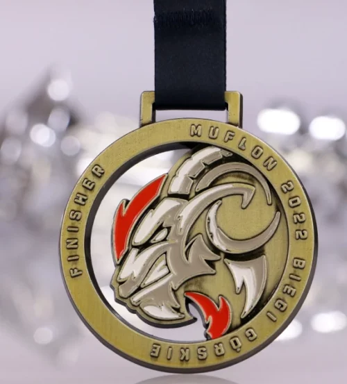 Medal na Biegi górskie Muflon o okrągłym kształcie z ciekawym zdobnictwem