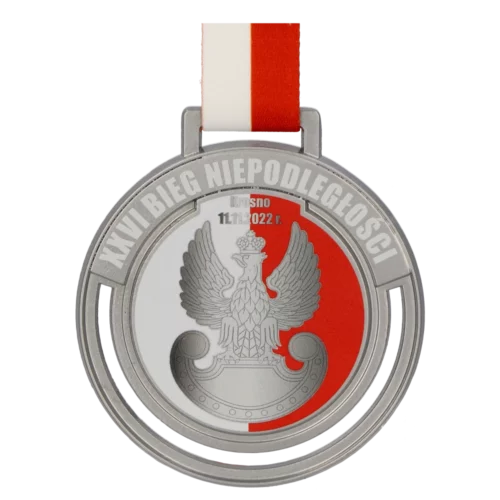 Medal na Bieg Niepodległości w Krośnie ma okrągły kształt oraz nowoczesne wycięcia wewnątrz - przód